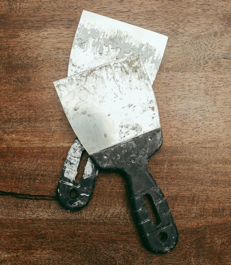 Spatulas on Wooden Surface