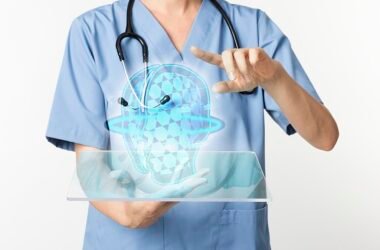 Doctors using transparent tablet with hologram medical technology